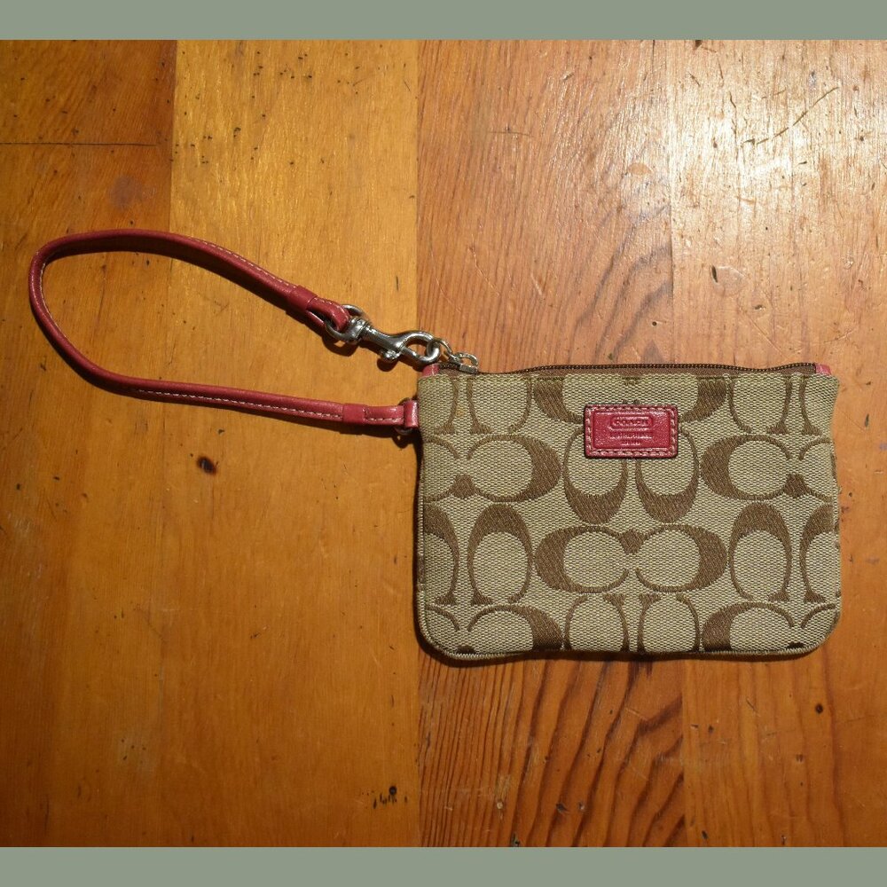 COACH Classic Tan Print Wristlet with Pink Accents